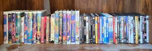 lot 161 image: Collection of Mixed VHS and DVD Movie Titles with Disney Classics