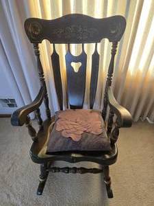 lot 167 image: Antique Wooden Rocking Chair with Detailed Backrest Design