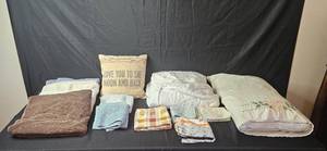 lot 221 image: Set of Towels, Bedding, and 3 Laundry Baskets