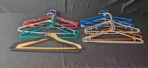 lot 231 image: Collection of Assorted Hangers with Plastic and Wooden Designs