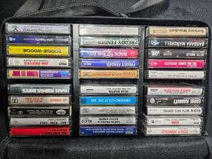 lot 296 image: Collection of 28 Vintage Cassette Tapes with Various Artists