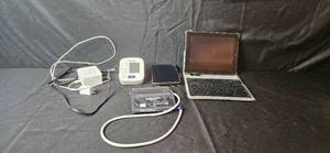 lot 240 image: Lot of Tech Devices Omron Blood Pressure Monitor, LG Smartphone, Apple iPad with Keyboard Case