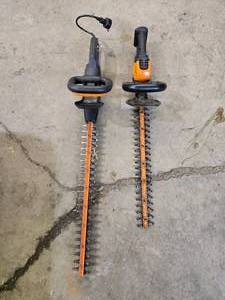 lot 21 image: Worx PowerShare Cordless Hedge Trimmers - Set of 2