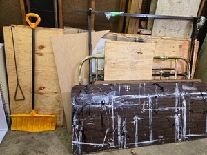 lot 36 image: Assorted Items and Materials including Plywood, Bed Frame, 8ft Folding Table, Snow Shovel and MORE