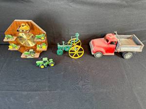 lot 112 image: Vintage Farm Toys Collection Clock, John Deere Models and Dump Truck