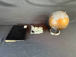 lot 114 image: Collection of Vintage Home Decor and Model Including Globe, Photo Album, and Caterpillar Tractor