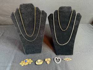 lot 410 image: Lot of Vintage Jewelry Gold-Tone Necklaces and Assorted Brooches