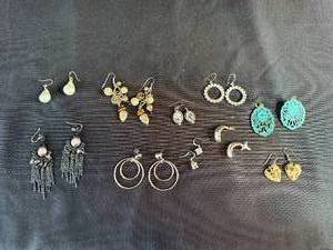 lot 429 image: Lot of Assorted Earrings with Various Designs