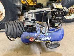 lot 8 image: Used Campbell Hausfeld 20 Gallon 5HP Air Compressor
