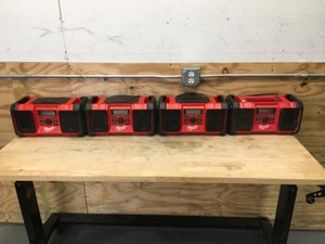 lot 131 image: Lot of 4 - Defective Milwaukee Jobsite Radios