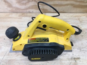 lot 27 image: DeWalt 7 Amp Corded 3-14 Hand Planer Model # DW680