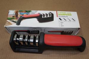 lot 12 image: Knife and Scissor Sharpener
