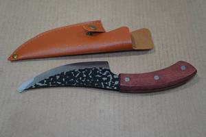 lot 31 image: Carbon Steel Viking Co Hammered Knife