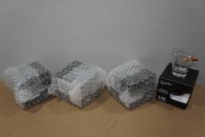 lot 109 image: 4 Lucky Shot 2oz Shot Glasses with Embedded Bullets
