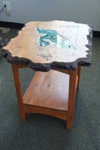 lot 118 image: Live Edge Cut and Epoxied Medicine Lake Side Table