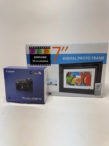 lot 21 image: Canon SX260 HS Digital Camera with 7 Digital Photo Frame