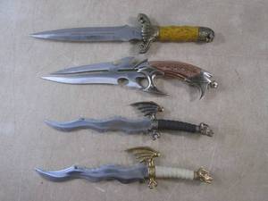(CS) 4 Decorative Knives No Sheaths...
