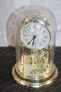 lot 131 image: Vintage Glass Dome Anniversary Clock with Gold Accents