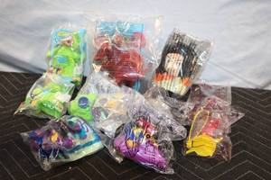 lot 143 image: Collection of 10 Sealed McDonalds Toys with Various Characters
