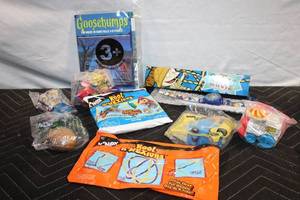 lot 145 image: Collection of Vintage Kids Toys and Puzzles - Rugrats, Goosebumps, and More