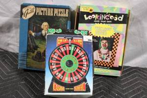 lot 163 image: Set of Picture Puzzle, Shrinkits Trinket Kit, and Casino Wheel Saving Bank