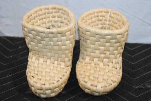 lot 168 image: Pair of Handwoven Natural Straw Baby Booties