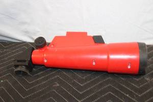 lot 180 image: Compact Red Handheld Telescope with Adjustable Eyepiece