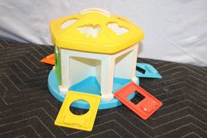 lot 182 image: Vintage Fisher-Price Shape Sorter Toy with Colorful Panels