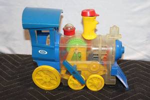 lot 197 image: Vintage Plastic Toy Train Engine with Bright Colors
