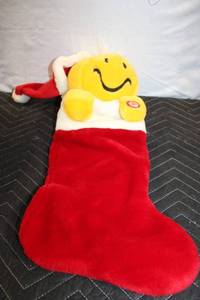 lot 206 image: Christmas Smiley Face Santa Hat Plush Stocking