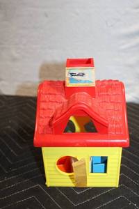 lot 208 image: Vintage Fisher Price Shape Sorting House Toy