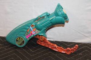 lot 209 image: Vintage 1990s Max Force Water Gun with Unique Design