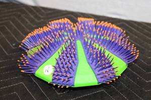 lot 211 image: Koosh Kaddy Green and Purple Toy Holder