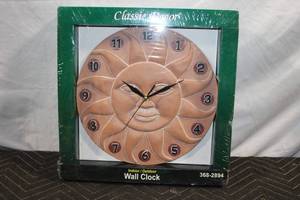 lot 213 image: Classic Decor 12 Sun Face IndoorOutdoor Wall Clock
