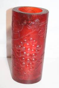 lot 227 image: Vintage Red Carved Glass Vase with Grape Motif