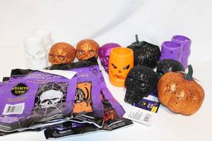 lot 269 image: Halloween Decor Set - Glitter Skulls, Pumpkins, and Door Covers