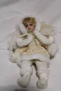 lot 315 image: Vintage Porcelain Angel Doll in Fur-Trimmed Outfit