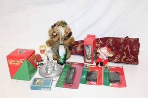 lot 372 image: Christmas Decoration Collection with Santa Figurines and Tree Skirt