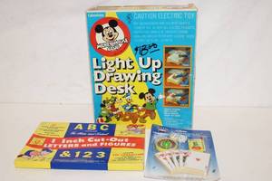 lot 373 image: Mickey Mouse Light Up Drawing Desk with ABC Letters and Casino Magnet Set