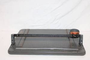 lot 384 image: Fiskars Rotary Paper Trimmer with Grid Markings