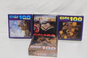 lot 388 image: Set of 4 Gift Box 100 Piece Puzzles with Unique Designs