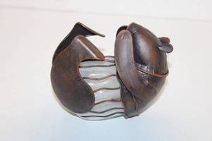 lot 394 image: Decorative Metal and Glass Squirrel Themed Candle Holder