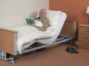lot 5 image: MSRP $5000 High Quality Arjo Huntleigh Minuet 2 Electric High & Very Low Adjustable Home Healthcare Bed WFree Used Mattress That Prevents Bedsores, Hand Remote & 5 Bed Extension For Taller Clients Works Excellent