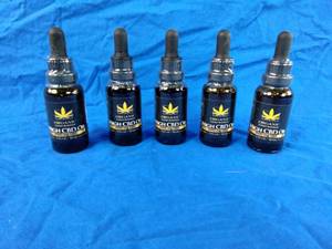 lot 39 image: Five New 1 oz Bottles of Organic 3000 mg CBD Oil