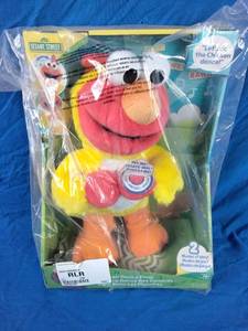lot 71 image: Sesame Street Chicken Dance Elmo Plush