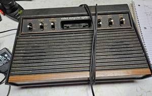 lot 93 image: Vintage Atari and games