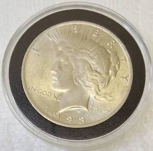 lot 28 image: Liberty Peace Dollar Coin - 1923 - Plastic Cover (View Photos)