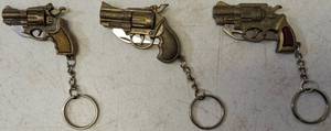 lot 30 image: Keychains - (3) Miniature Metal Gun Keychains  Fold Up Knives (View Photos)