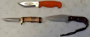 lot 33 image: Knives (1) Trophy Hunter (Orange Handle) (1) Chipaway Cutlery (Multi Color Handle) (1) Frost (Faux Wood Handle)  View Photos