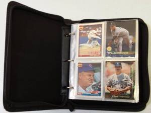 lot 35 image: Random Assortment of Baseball Cards Inside a Baseball League Binder  Bonus Cards (Mix of Baseball & Basketball Cards)